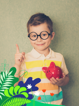 Little boy with glasses and a piggy bank