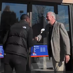 two men shaking hands