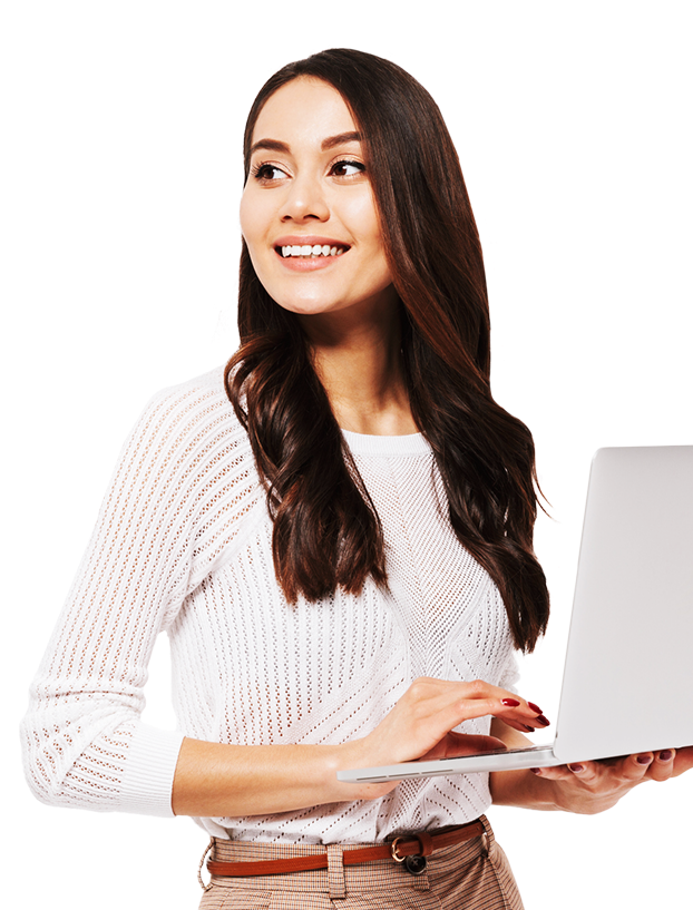 woman holding and typing on a laptop